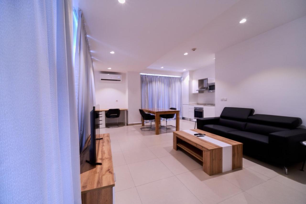 Suncity Hotel Apartment Аккра Экстерьер фото