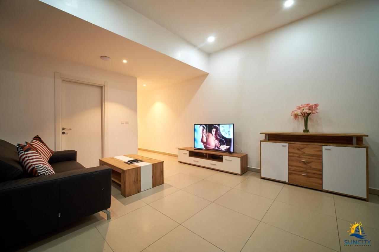 Suncity Hotel Apartment Аккра Экстерьер фото