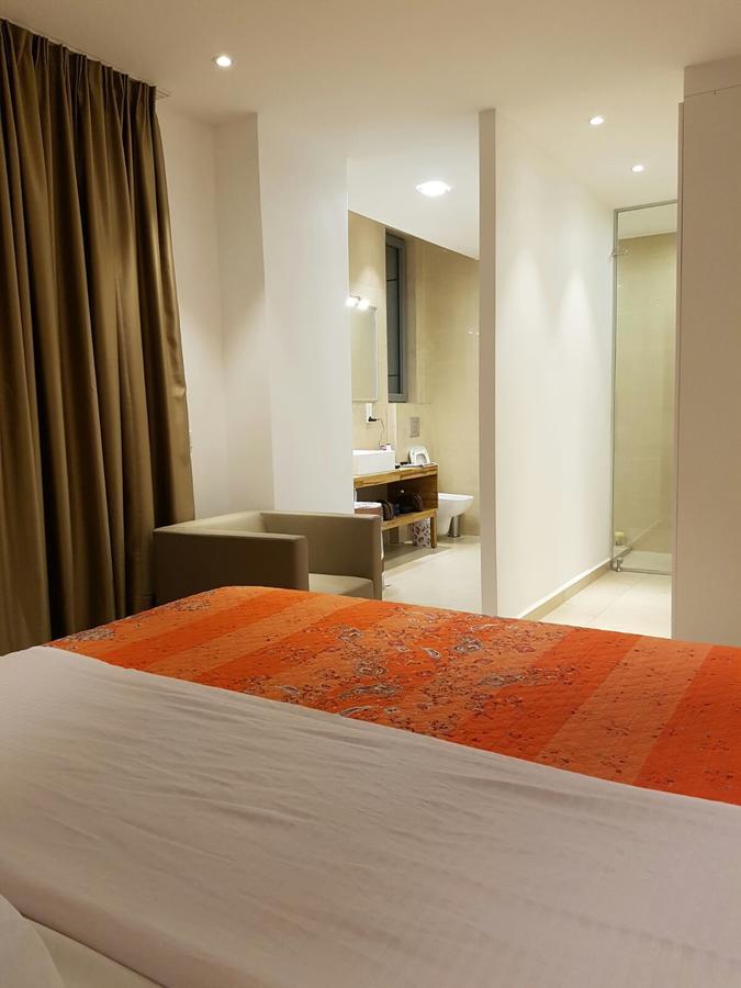 Suncity Hotel Apartment Аккра Экстерьер фото