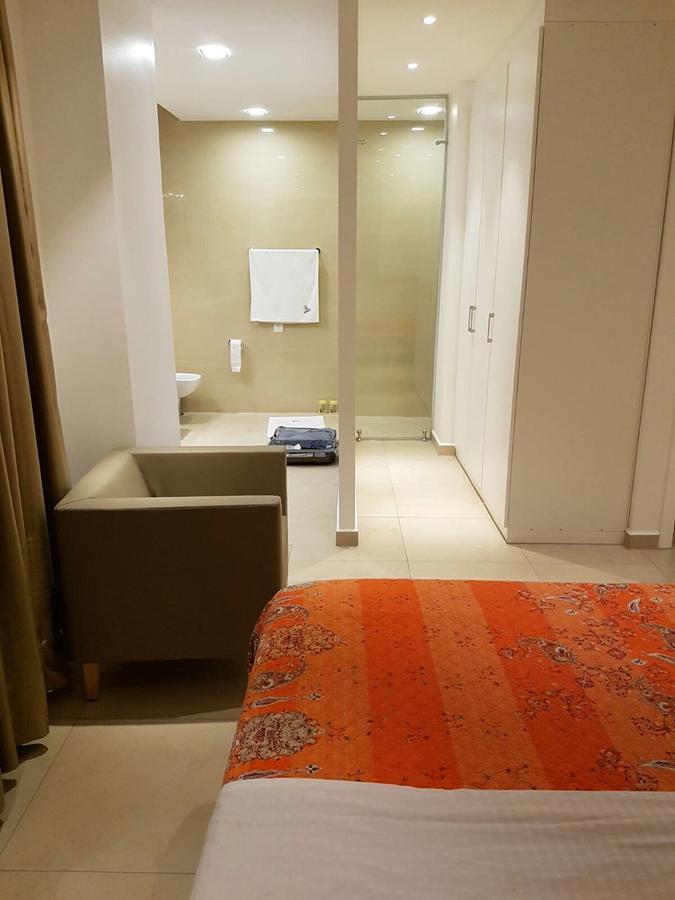 Suncity Hotel Apartment Аккра Экстерьер фото