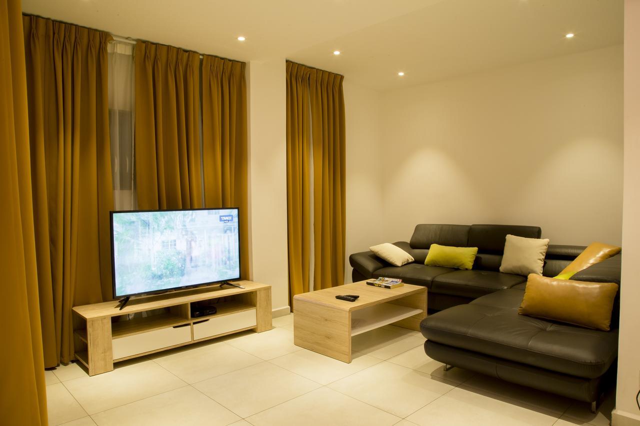 Suncity Hotel Apartment Аккра Экстерьер фото