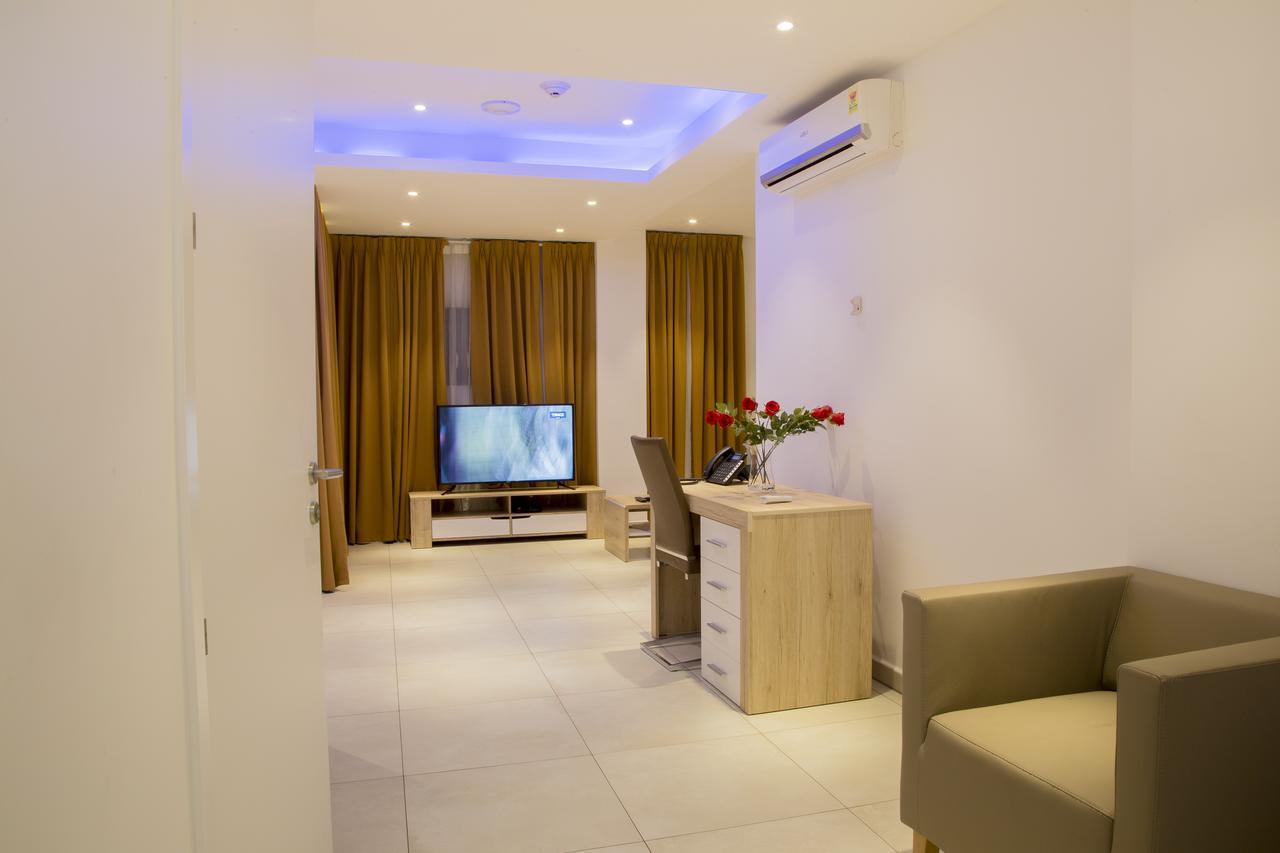 Suncity Hotel Apartment Аккра Экстерьер фото